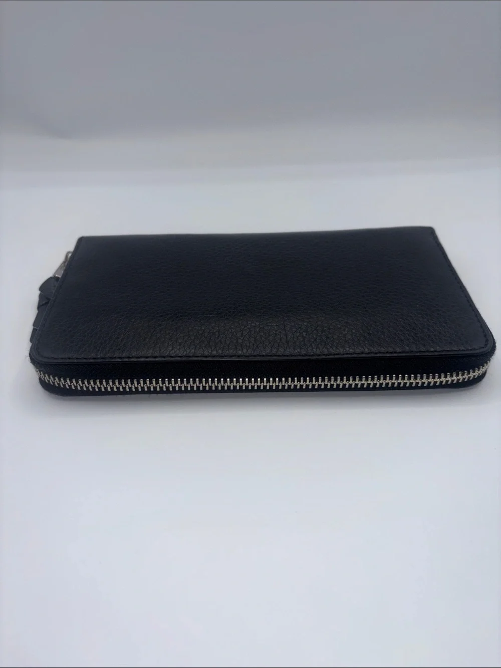 Tory Burch sleek zip
